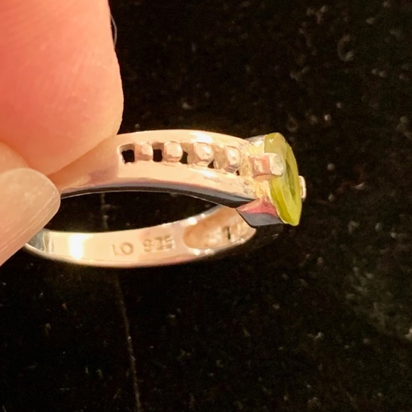 Sterling Silver ring (stamped 925).  Peridot stone.  Size 8. - Picture 4 of 4